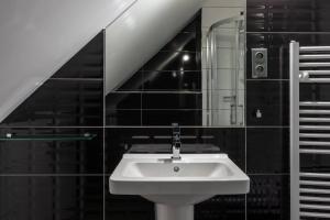 Koupelna v ubytování Hotel Grand