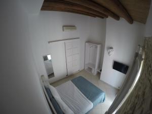 A bed or beds in a room at PIETRAVIVA