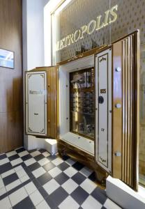 a room with a wine cabinet in a store at Hotel Metropolis in Kaunas