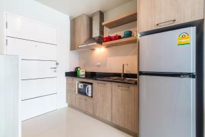 Cuisine ou kitchenette dans l'établissement Apartments at The Bliss Condo by Lofty