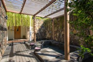 a swimming pool in the middle of a building at Jeeva Klui Resort in Senggigi