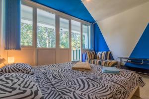 Posteľ alebo postele v izbe v ubytovaní APARTMAN MLADENKA