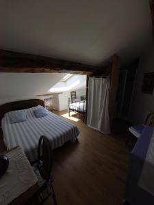 Postel nebo postele na pokoji v ubytování Gite Cal Pai
