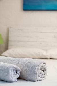 A bed or beds in a room at Boutique Art Villa Maria
