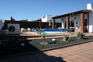 Bazén v ubytování VILLA DREAMS - VILLAS LA ESTANCIA - nebo v jeho okolí
