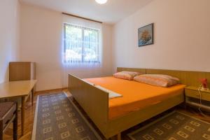Postel nebo postele na pokoji v ubytování APARTMAN VERA