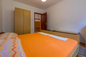 Postel nebo postele na pokoji v ubytování APARTMAN VERA