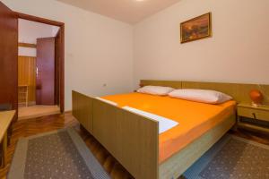 Postel nebo postele na pokoji v ubytování APARTMAN VERA