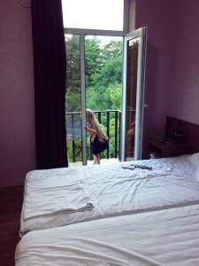 Voodi või voodid majutusasutuse Hotel Giorgi toas