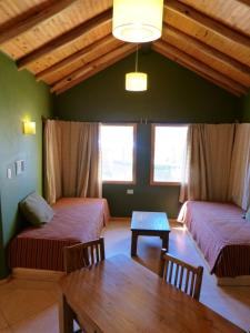 Voodi või voodid majutusasutuse Cabañas Monte Coiron toas