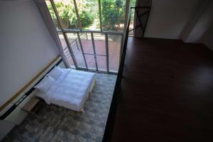 Postel nebo postele na pokoji v ubytování Toptai Homestay