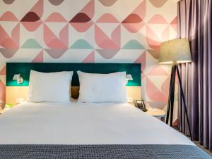 Posteľ alebo postele v izbe v ubytovaní Holiday Inn - Warsaw City Centre by IHG