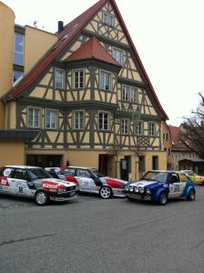 a group of cars parked in front of a building at Krone Langenburg in Langenburg