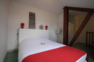 Cama o camas de una habitación en Domaine des Compouzines