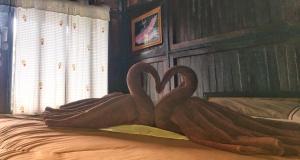 Ein Bett oder Betten in einem Zimmer der Unterkunft Phi Phi Green Hill Resort