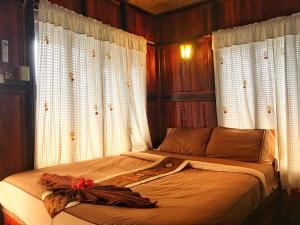 Ein Bett oder Betten in einem Zimmer der Unterkunft Phi Phi Green Hill Resort