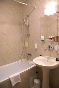 Kúpeľňa v ubytovaní Hotel Metropol