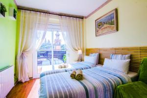 Posteľ alebo postele v izbe v ubytovaní Unique Cozy Scenic Penthouse
