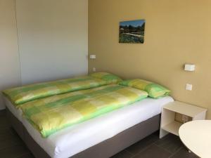 
Ein Bett oder Betten in einem Zimmer der Unterkunft Bed & Breakfast Oasee
