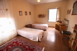 Posteľ alebo postele v izbe v ubytovaní Casa Vacanze Botteghelle