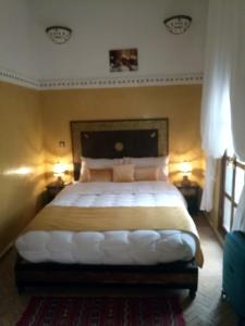 Postel nebo postele na pokoji v ubytování Riad Schanez