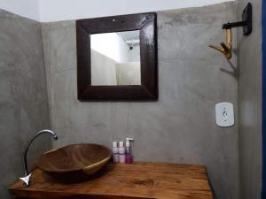 Um banheiro em Pousada Três Marias Caraíva