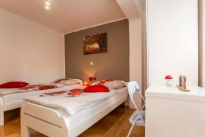 Postel nebo postele na pokoji v ubytování Apartman Barbara