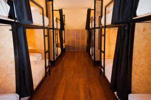 Voodi või voodid majutusasutuse Xplora Hostel Cusco toas