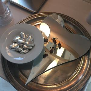 a plate with a bowl of spoons on a table at CalVenere in Calvene +156 photos