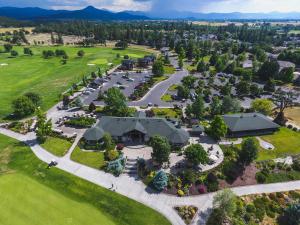 an aerial view of a park with a building at Resort at Eagle Point Golf Club Lodging in Medford
