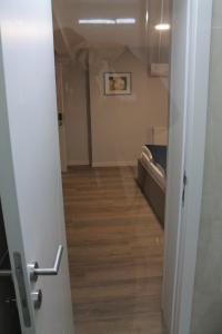 Postel nebo postele na pokoji v ubytování Sleep Inn Prishtina