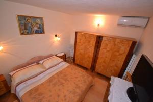 Ένα ή περισσότερα κρεβάτια σε δωμάτιο στο Apartments Kat - 80 m from beach