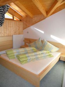 מיטה או מיטות בחדר ב-Landhaus Müller