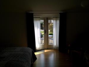Postel nebo postele na pokoji v ubytování Bed & Breakfast Uiterburen