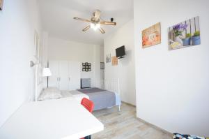 A bed or beds in a room at Cortesia 4