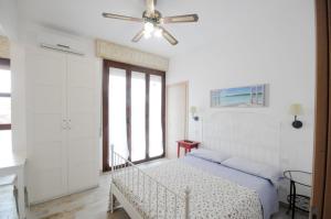 A bed or beds in a room at Cortesia 4