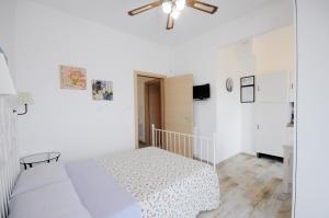 A bed or beds in a room at Cortesia 4