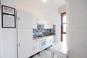 A kitchen or kitchenette at Cortesia 4