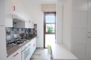 A kitchen or kitchenette at Cortesia 4