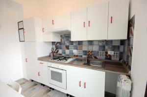 A kitchen or kitchenette at Cortesia 4