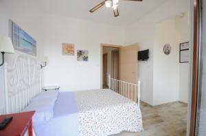 A bed or beds in a room at Cortesia 4