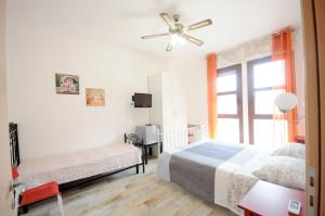 A bed or beds in a room at Cortesia 4
