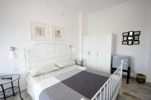 A bed or beds in a room at Cortesia 4