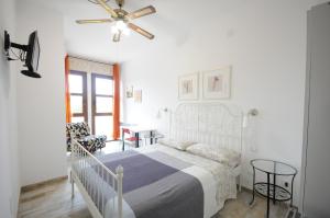 A bed or beds in a room at Cortesia 4