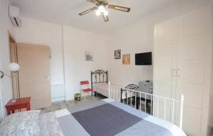 A bed or beds in a room at Cortesia 4