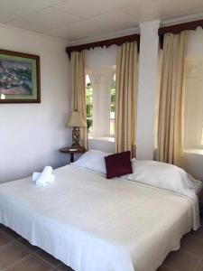 Postel nebo postele na pokoji v ubytování Hotel Andrea