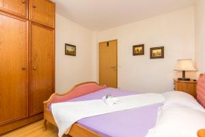 Postel nebo postele na pokoji v ubytování Apartments Luxury view