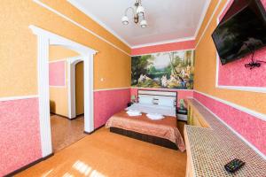 Μια τηλεόραση ή/και κέντρο ψυχαγωγίας στο Apartment Hotel