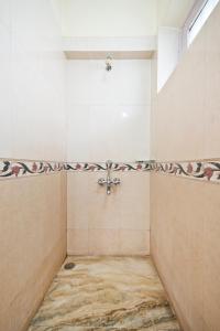 Letto o letti in una camera di Prakash Kutir B&B