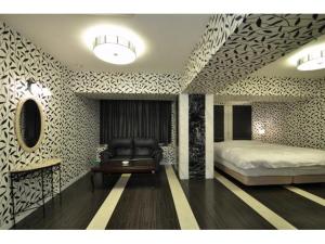 Letto o letti in una camera di Hotel ShaSha Resort Suma